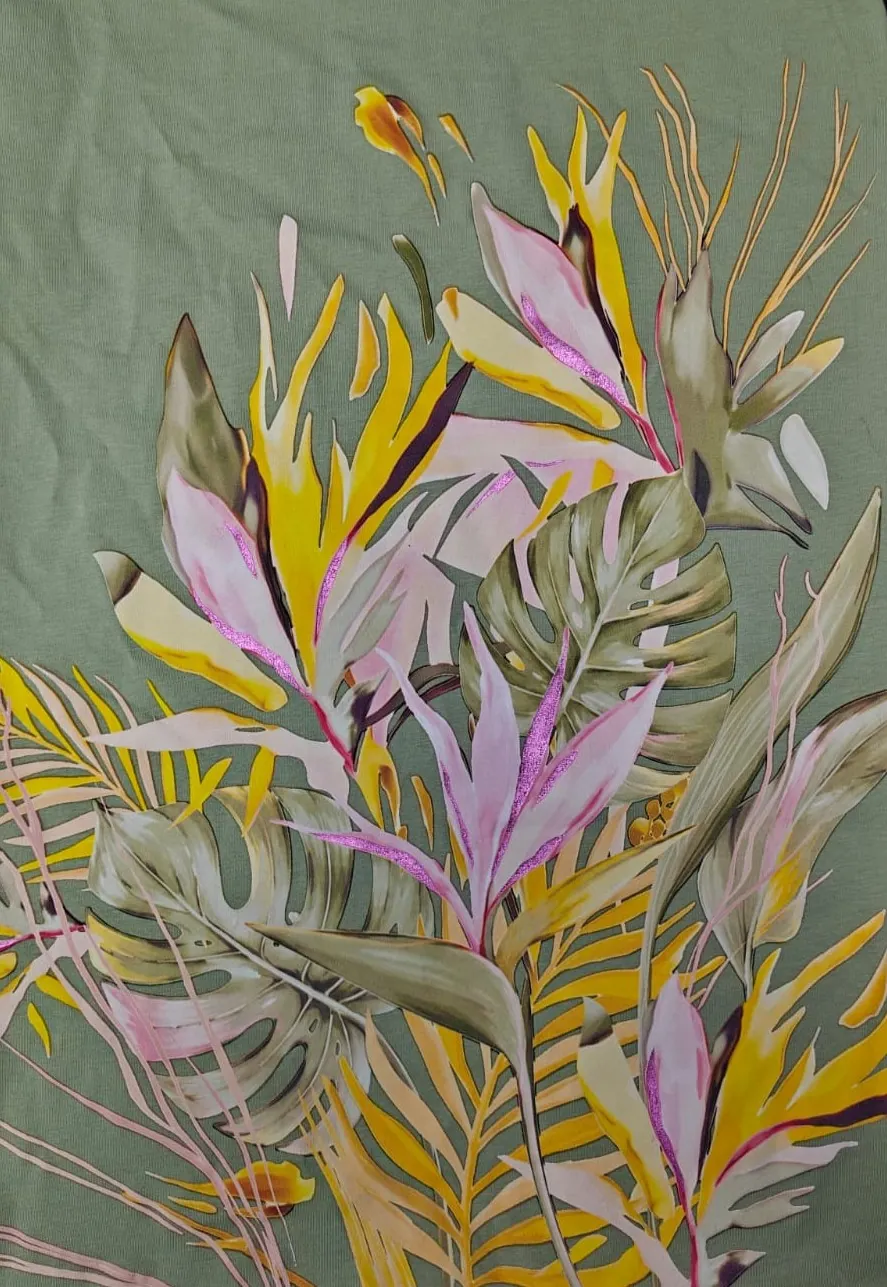 Hybrid digital and metallic foil floral placement print on a sage cotton tee